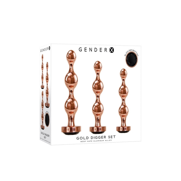 Conjunto de plugs anais Gold Digger com três tamanhos, design esférico, liga de alumínio compatível com variações térmicas e base com joia preta brilhante.