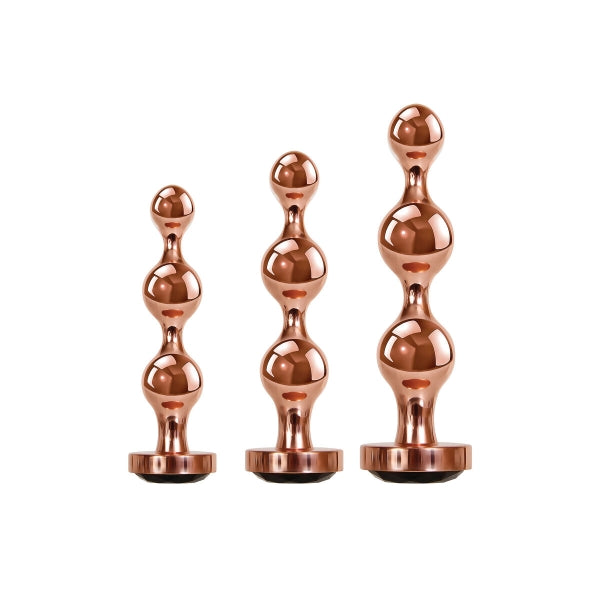 Conjunto de plugs anais Gold Digger com três tamanhos, design esférico, liga de alumínio compatível com variações térmicas e base com joia preta brilhante.