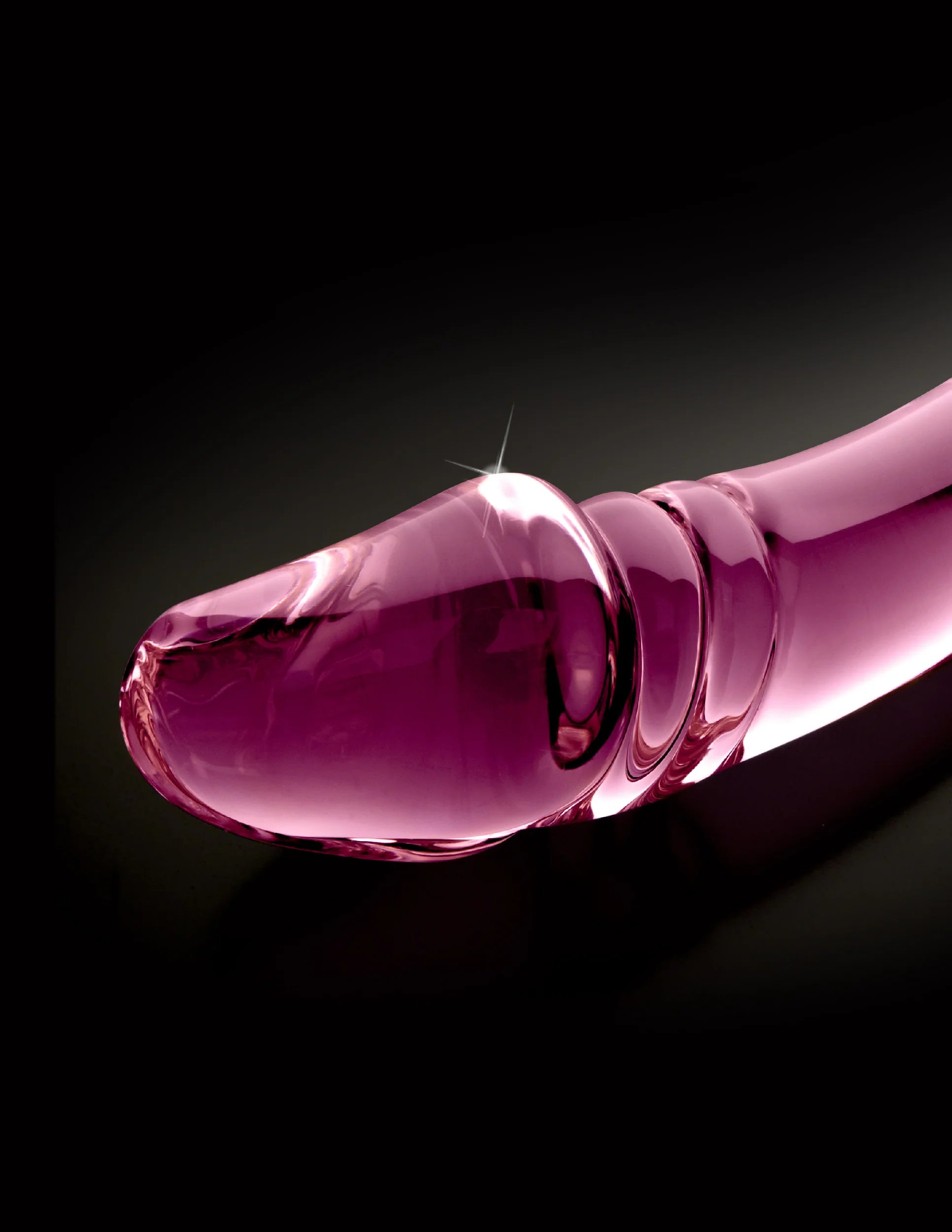Dildo de vidro Icicles Nº57 com duas extremidades: uma ponta bulbosa para estimulação intensa e uma textura em espiral para arrepios de prazer, feito em vidro borossilicato compatível com variações térmicas.