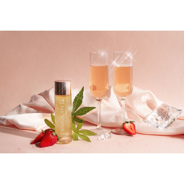 Frasco do Óleo de Massagem HighOnLove® com fragrância sensual de morango e champanhe.