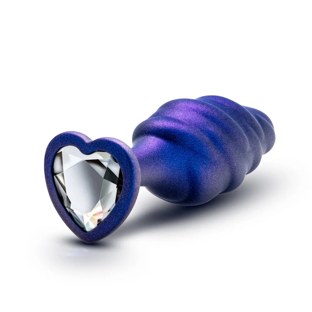 Plug anal Anal Adventures Matrix Bumped Bling com textura ondulada, base em forma de coração com jóia azul e tecnologia StayPut™ para um encaixe seguro e confortável.