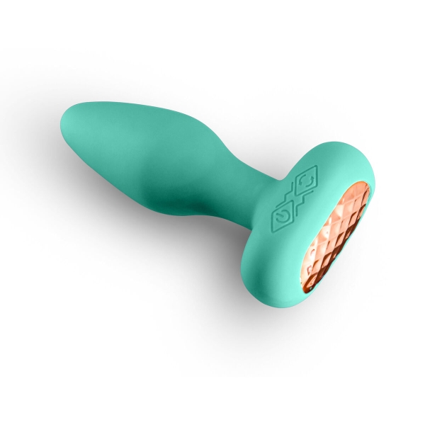 Plug anal vibratório verde com vibrações intensas e design em silicone macio, ideal para momentos íntimos e intensos.