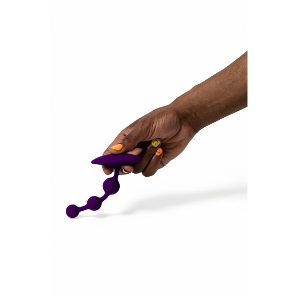Plug anal ROMP Amp com esferas graduadas e design flexível para prazer progressivo e confortável.