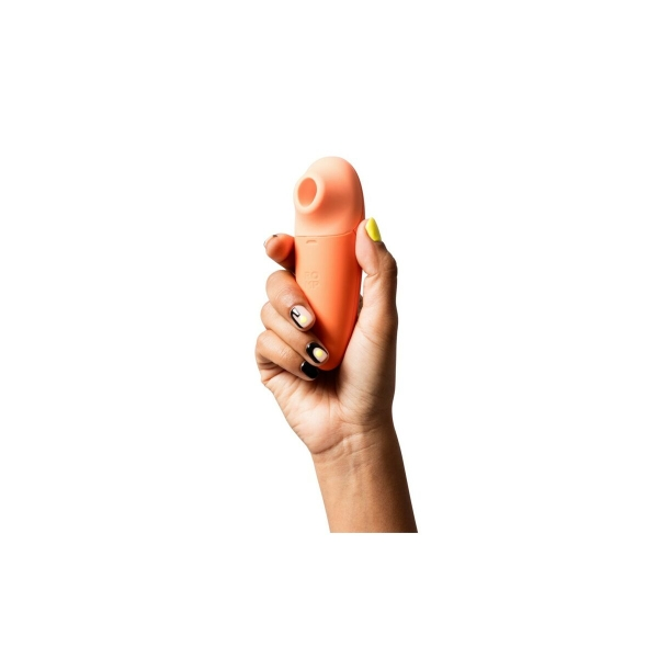 Estimulador clitoriano ROMP Switch X, compacto e sem fio, com tecnologia Pleasure Air™ para estimulação de sucção.